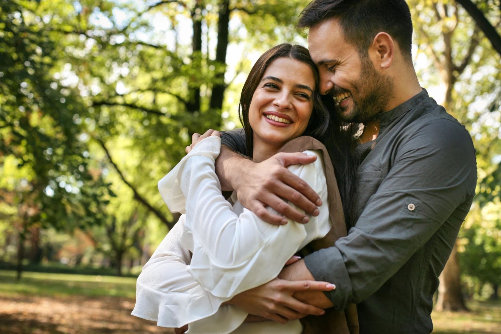 Couple embracing outdoors