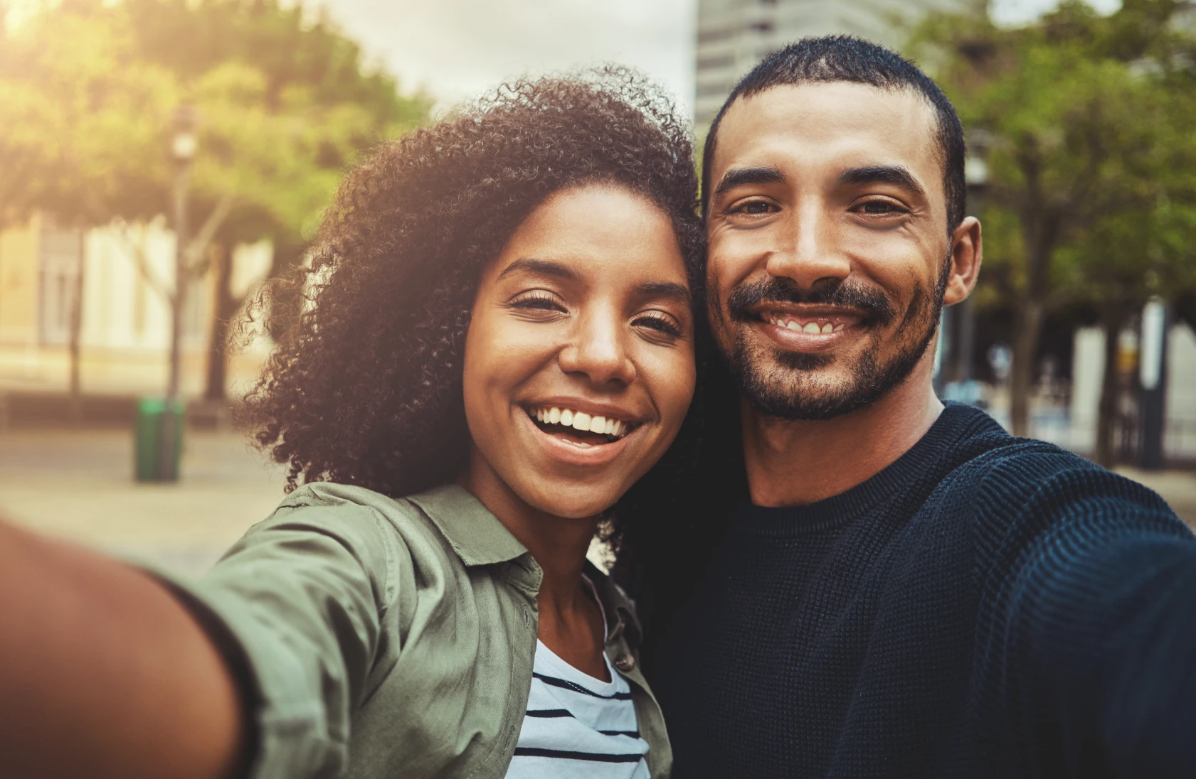 Couple smiling together outdoors
